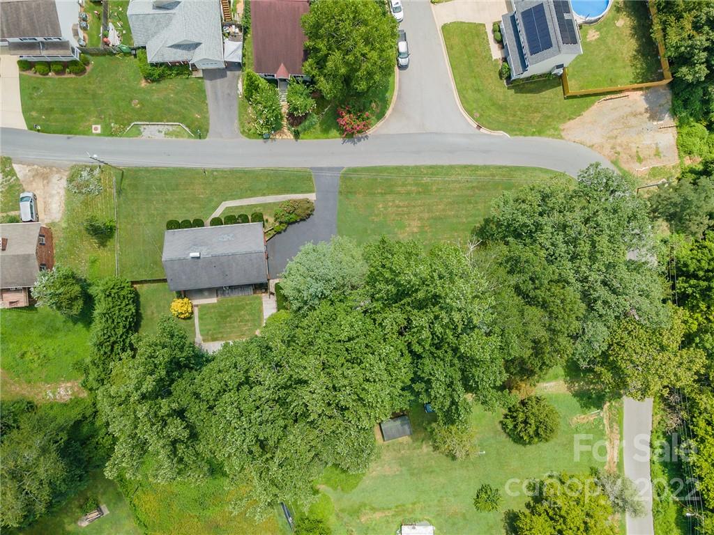 62 Round Top Road Asheville, NC 28803 - Photo 45 of 46 an aerial view of a house with swimming pool outdoor seating and yard
