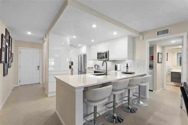 $655,000 | 4780 Brittany Drive South, Unit 11, St. Petersburg, FL 33715