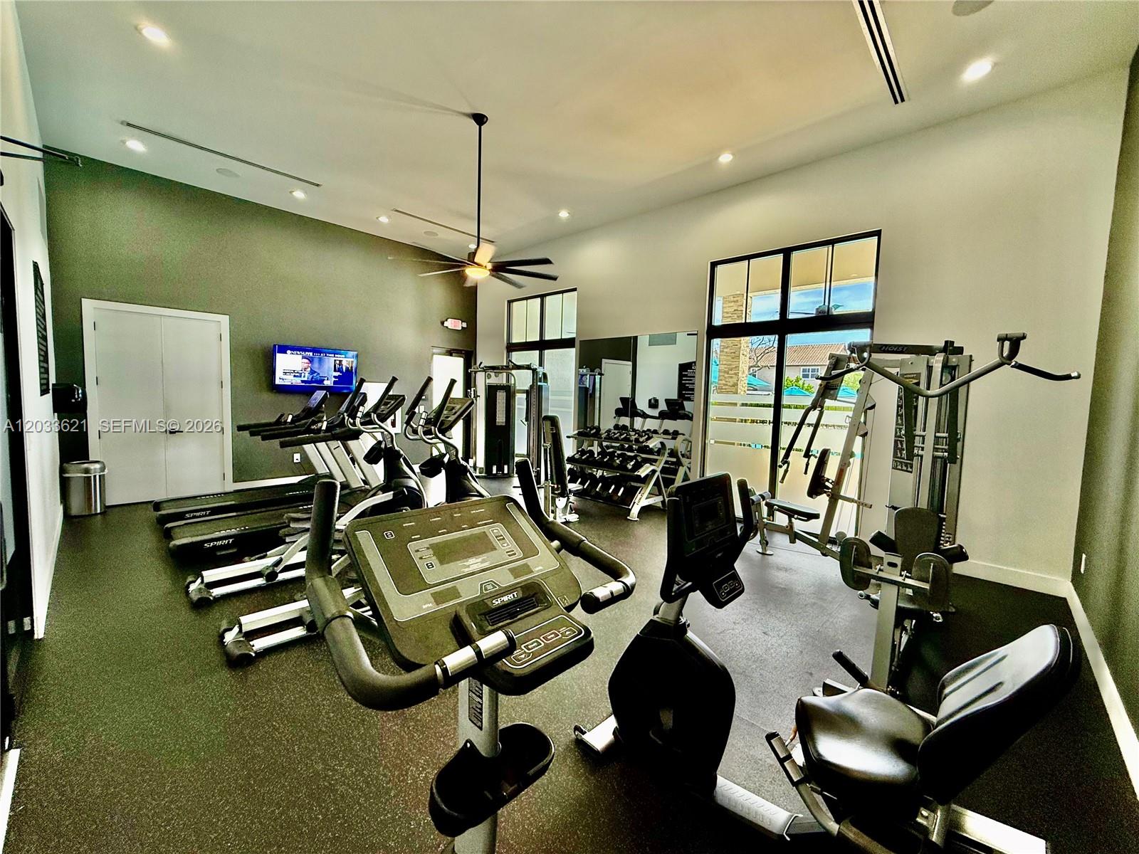 11942 Southwest 243rd Street Homestead, FL 33032 - Photo 44 of 50 a room with gym equipment