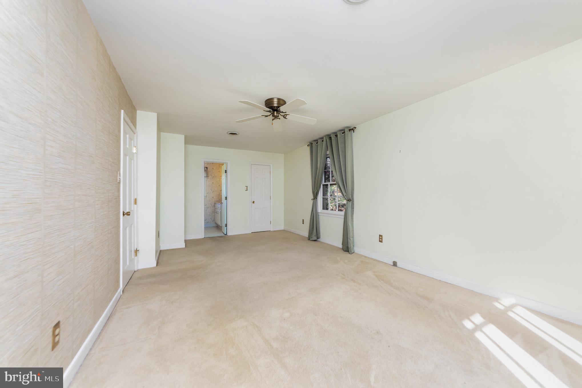 13000 Silver Crest Road Chester, VA 23831 - Photo 18 of 28 a view of empty room with ceiling fan