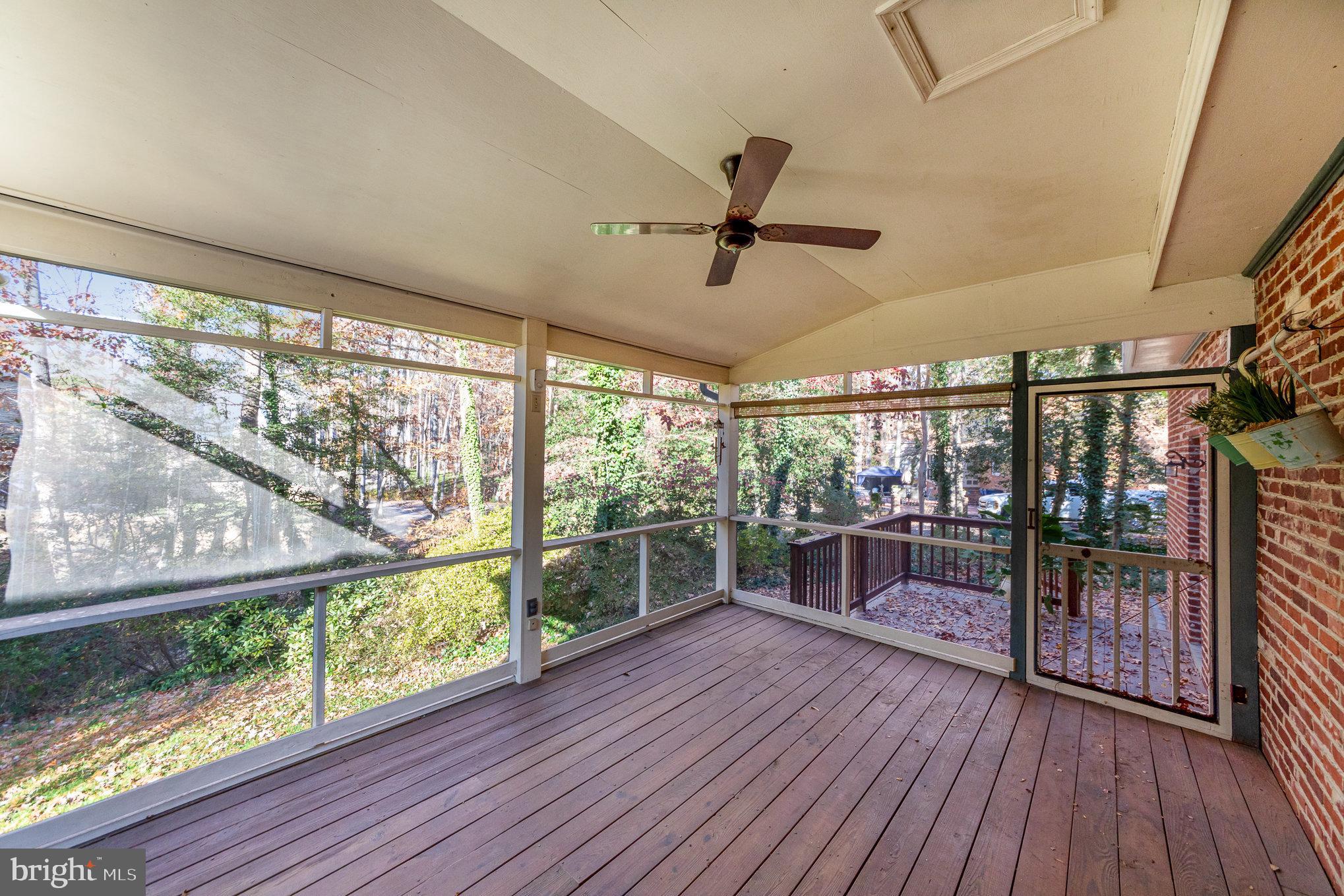13000 Silver Crest Road Chester, VA 23831 - Photo 26 of 28 a view of a porch with wooden floor