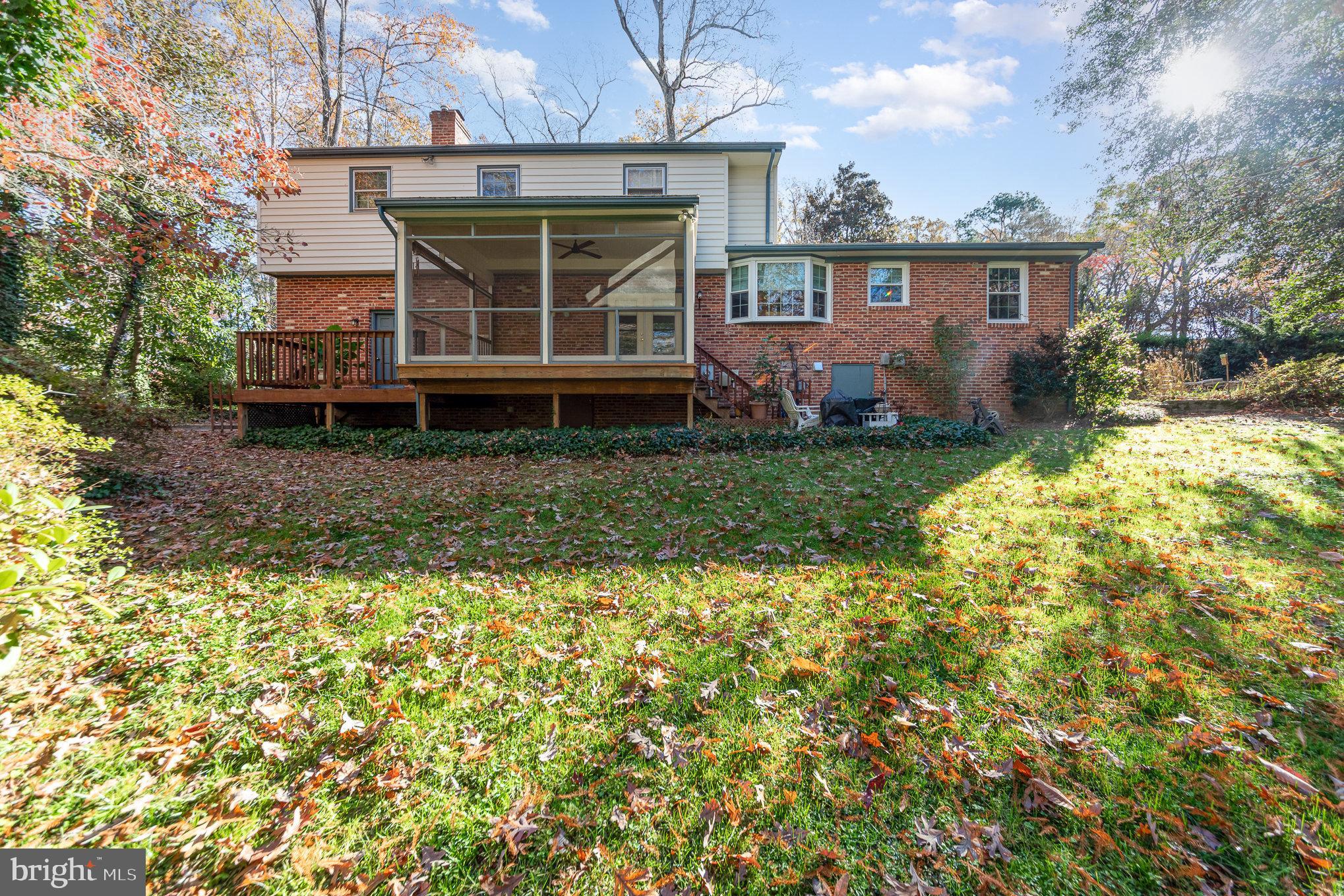 13000 Silver Crest Road Chester, VA 23831 - Photo 27 of 28 a view of a house with backyard and sitting area