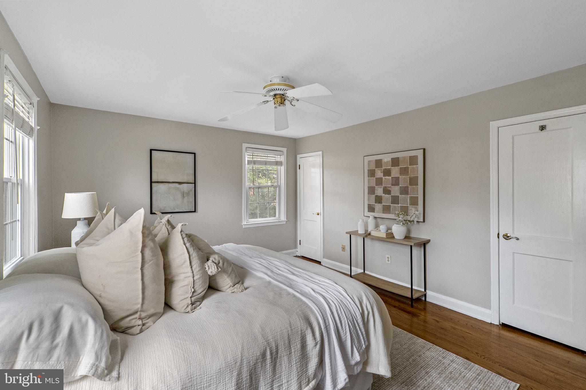 1541 Doxbury Road Baltimore, MD 21286 - Photo 23 of 37 a bedroom with a bed and a chandelier