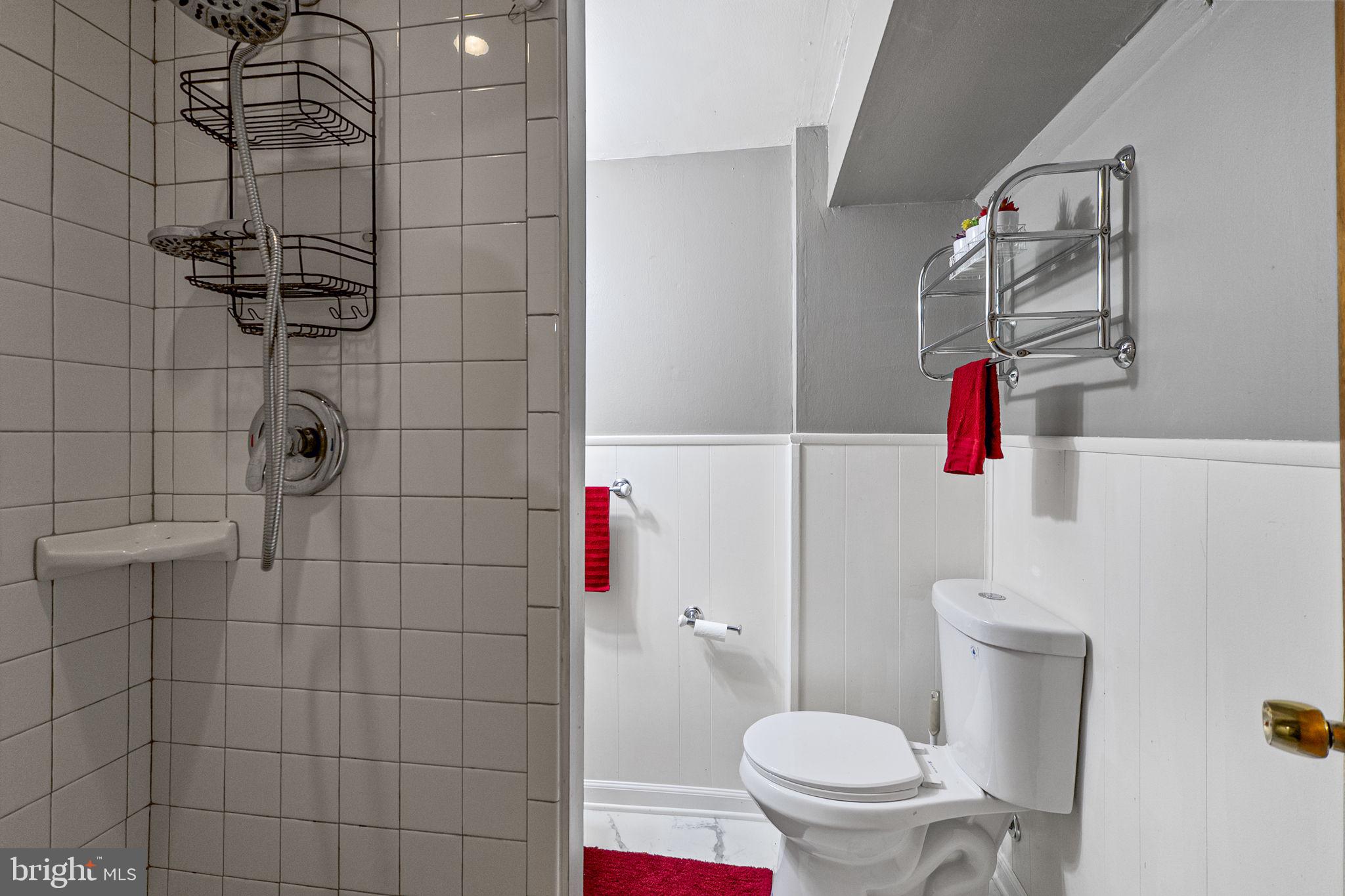 1541 Doxbury Road Baltimore, MD 21286 - Photo 35 of 37 a bathroom with a toilet and a shower