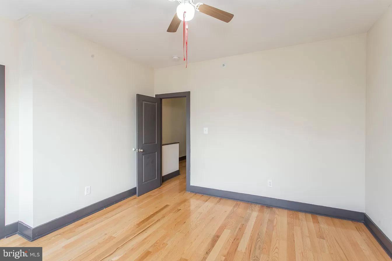 1826 West Norris Street, Unit 2 Philadelphia, PA 19121 - Photo 22 of 23 a view of an empty room with a window