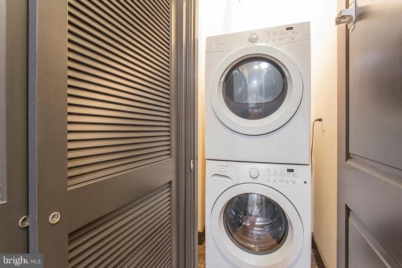 1826 West Norris Street, Unit 2 Philadelphia, PA 19121 - Photo 23 of 23 a close view of a utility room with dryer and washer