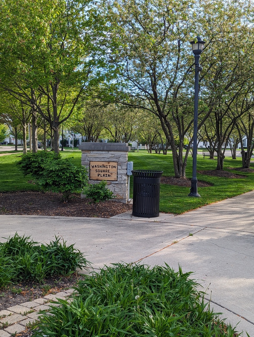 2257 Georgetown Circle Aurora, IL 60503 - Photo 19 of 19 a front view of a house with garden