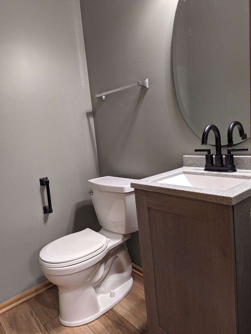 2257 Georgetown Circle Aurora, IL 60503 - Photo 7 of 19 a bathroom with a sink and a toilet