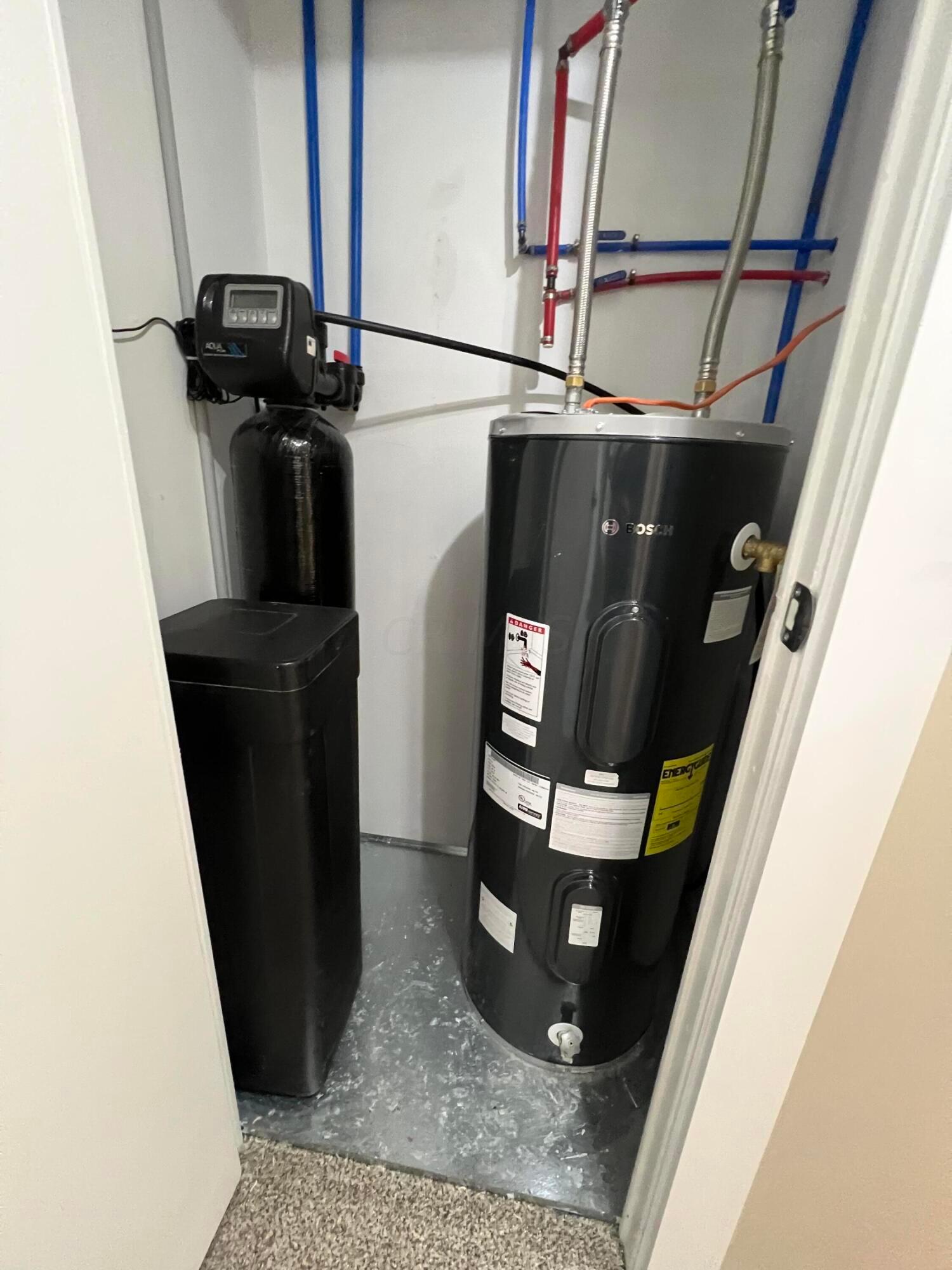 22555 State Rte 207 New Holland, OH 43145 - Photo 34 of 35 Water softener and Hot water tank