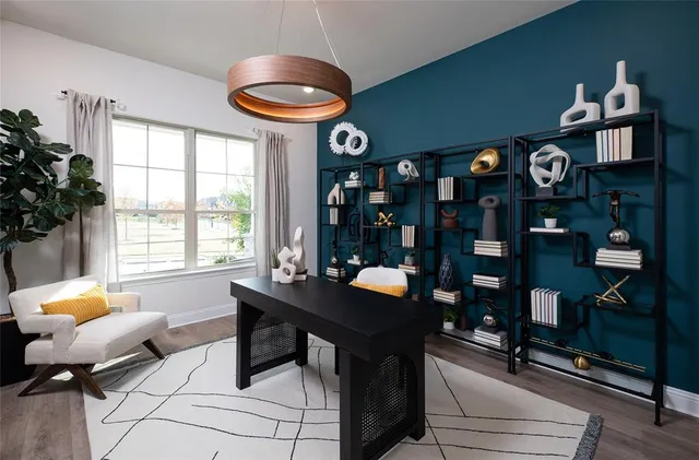 a dining room with furniture and window