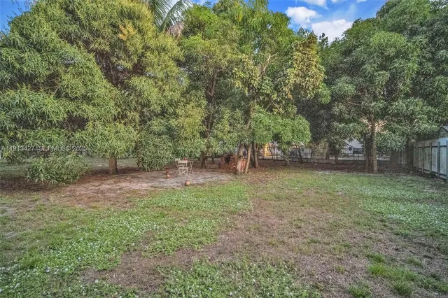 a view of outdoor space and yard