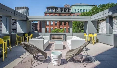 a view of a chairs and tables in the patio