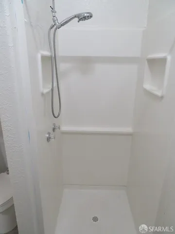 a bathroom with a bath tub