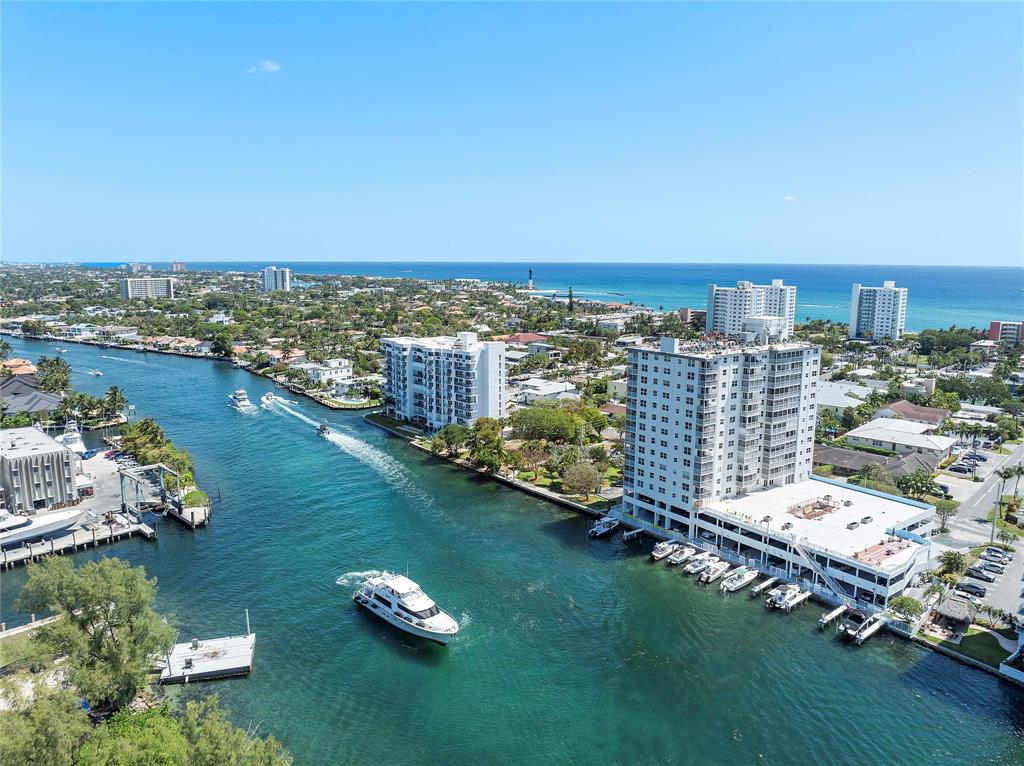 1505 North Riverside Drive, Unit 1003 Pompano Beach, FL 33062 - Photo 27 of 33 an aerial view of a house with a yard basket ball court and outdoor seating