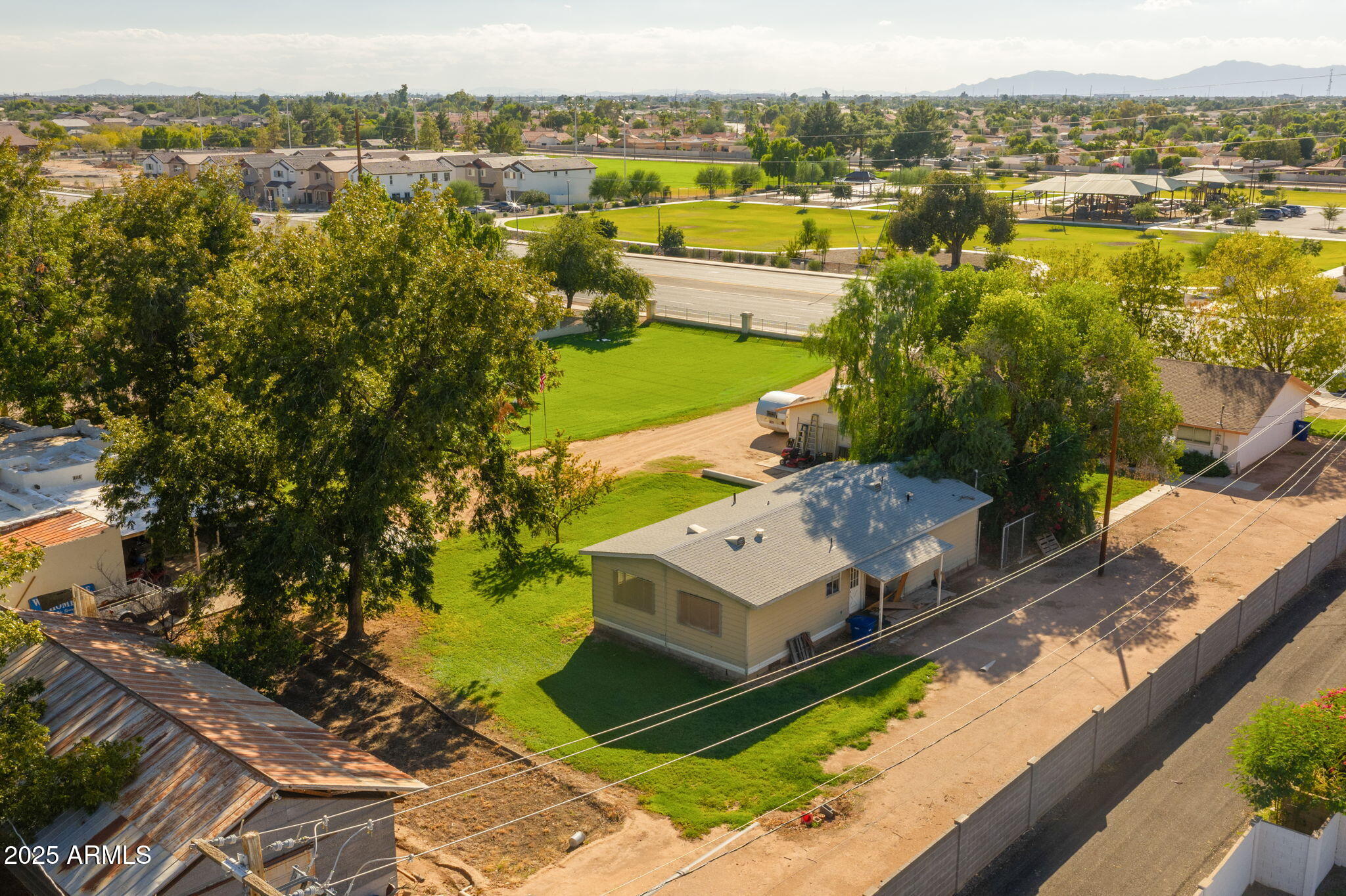 333 South Cooper Road Chandler, AZ 85225 - Photo 10 of 68 an aerial view of a house with a lake view