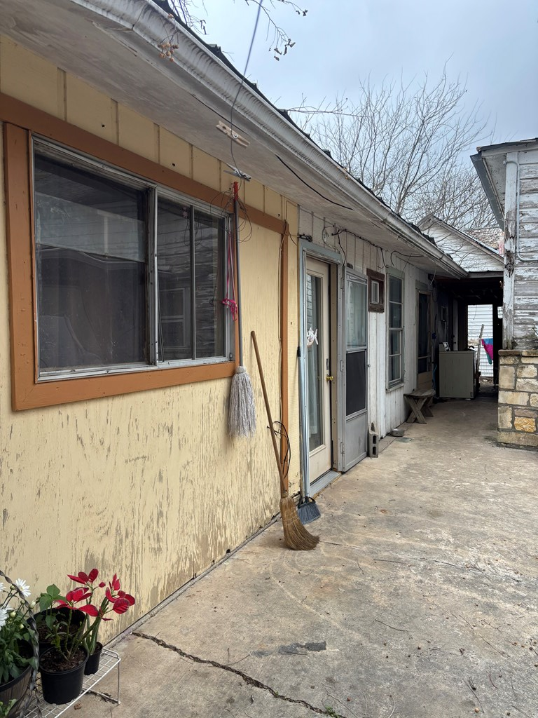 725 Swigert Street Kerrville, TX 78028 - Photo 16 of 17 a view of a house with a potted plant and empty space