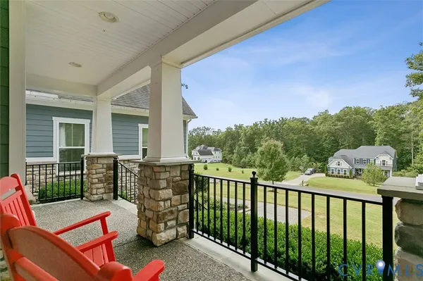 a view of a two chairs in the roof deck