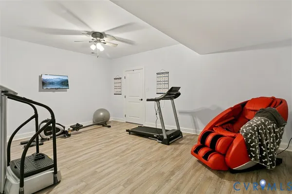 a view of a house with a yard and roof