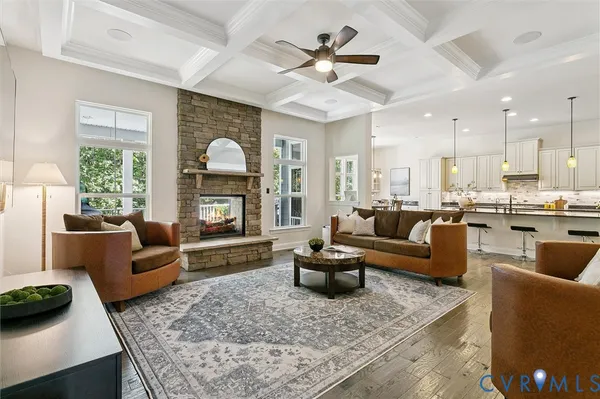 a living room with furniture and a rug