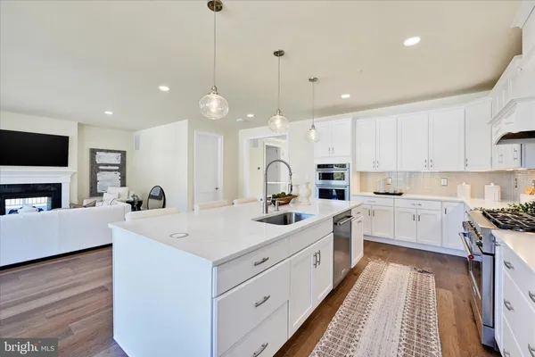 a bedroom with a bed and a lamp