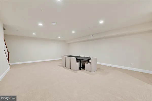 a view of a balcony with wooden floor