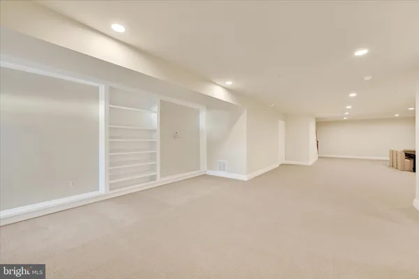 a picture of a bathroom with a shower