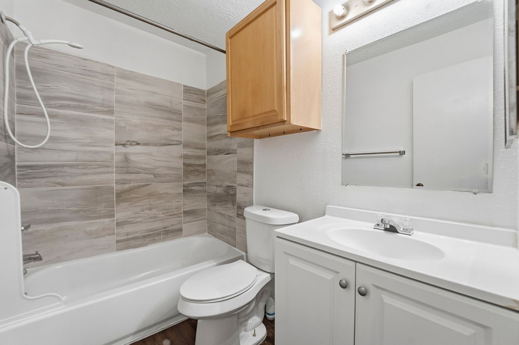 4542 Algernon Drive Spring, TX 77373 - Photo 12 of 19 a bathroom with a sink a toilet and shower