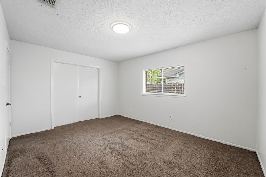 4542 Algernon Drive Spring, TX 77373 - Photo 14 of 19 a view of an empty room with a window