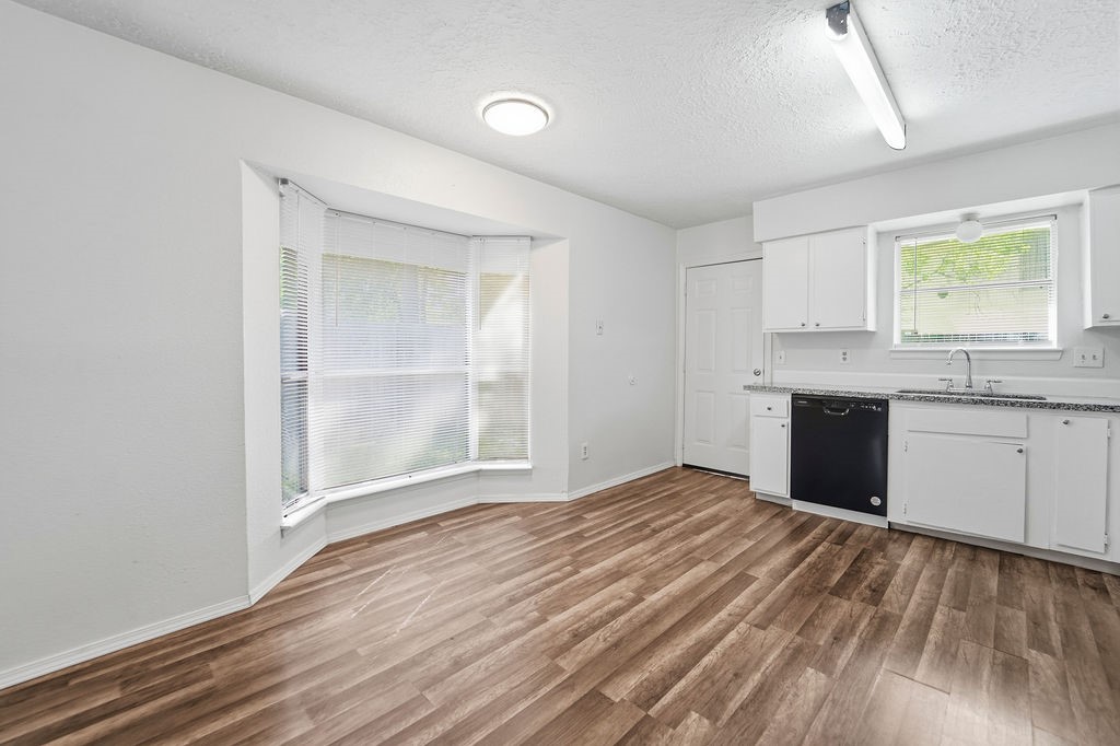 4542 Algernon Drive Spring, TX 77373 - Photo 3 of 19 a view of a kitchen with a sink and a window