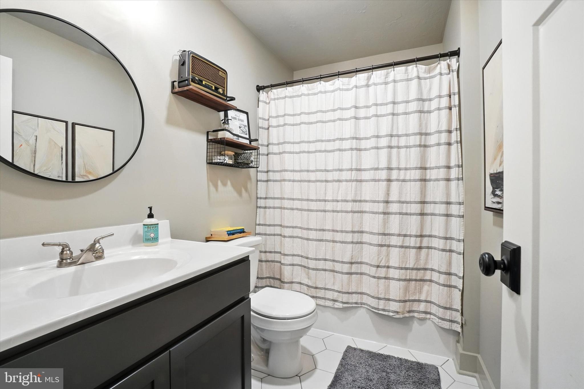 894 Ridgeview Road Seven Valleys, PA 17360 - Photo 23 of 39 a bathroom with a sink a toilet and shower