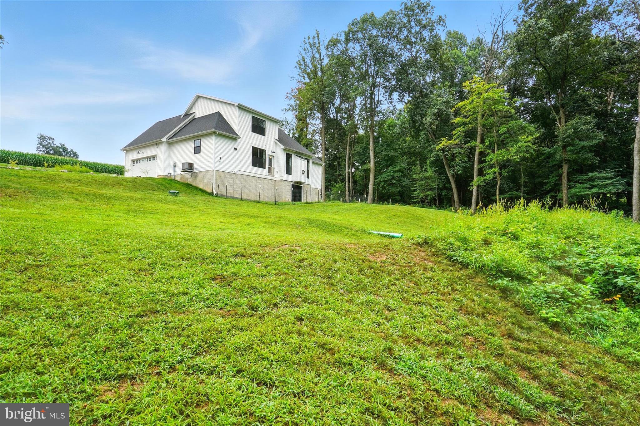 894 Ridgeview Road Seven Valleys, PA 17360 - Photo 31 of 39 a view of a house with backyard and garden