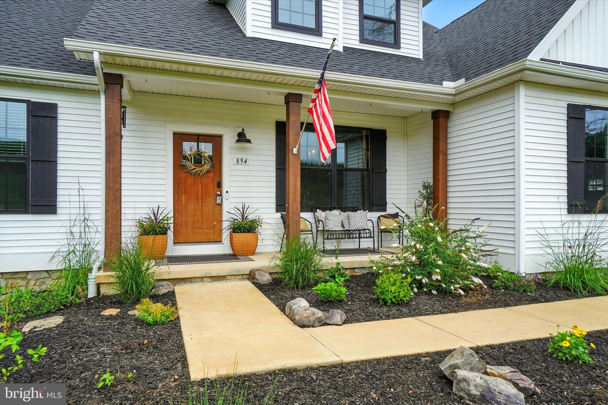 894 Ridgeview Road Seven Valleys, PA 17360 - Photo 5 of 39 a front view of a house with garden