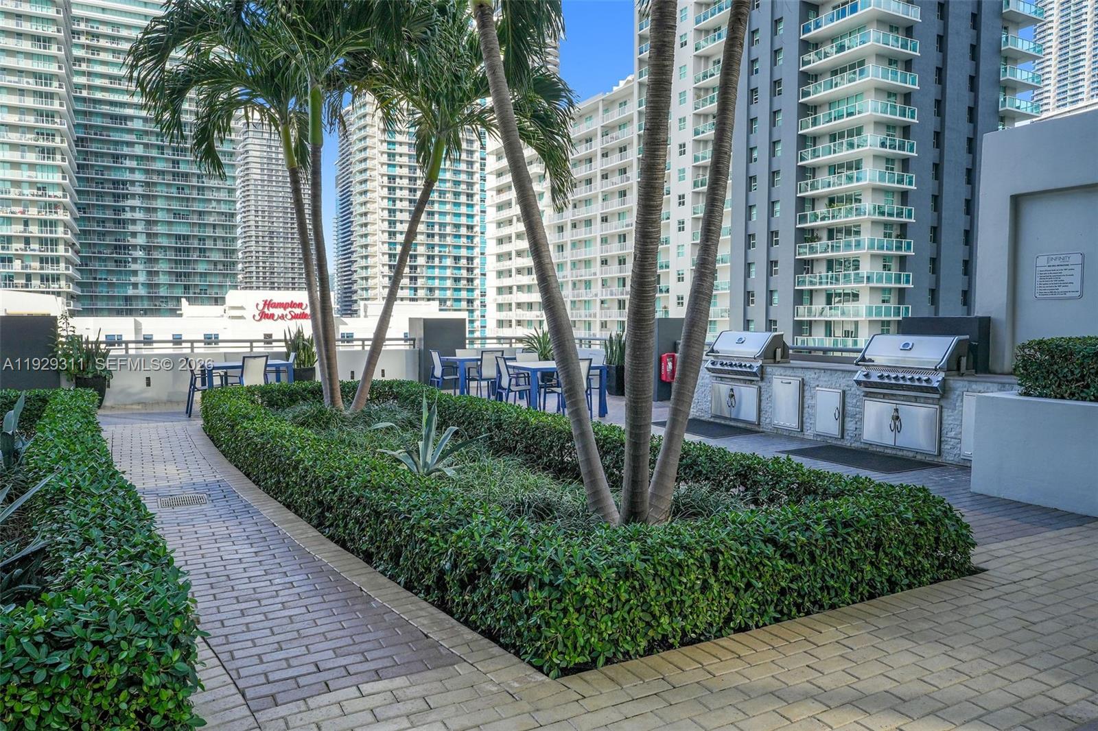 60 Southwest 13th Street, Unit 4607 Miami, FL 33130 - Photo 29 of 39 a garden view with a seating space