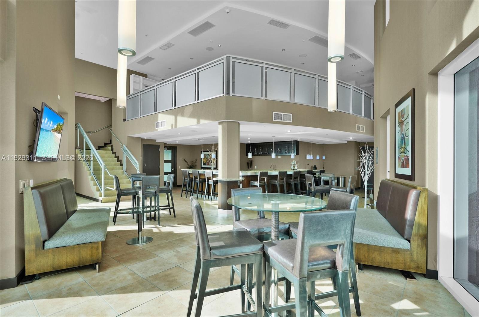 60 Southwest 13th Street, Unit 4607 Miami, FL 33130 - Photo 35 of 39 a dinning area with furniture and kitchen view