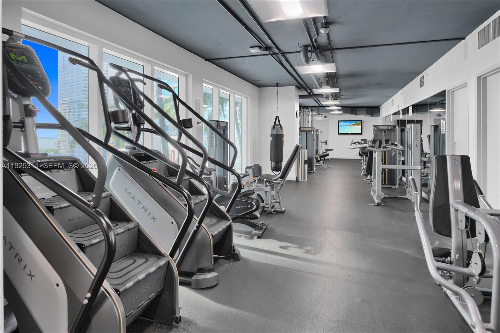 60 Southwest 13th Street, Unit 4607 Miami, FL 33130 - Photo 36 of 39 a view of a room with gym equipment