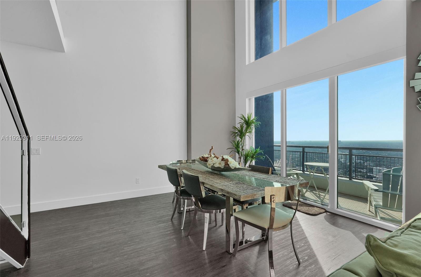 60 Southwest 13th Street, Unit 4607 Miami, FL 33130 - Photo 7 of 39 a view of a dining room with furniture window and outside view