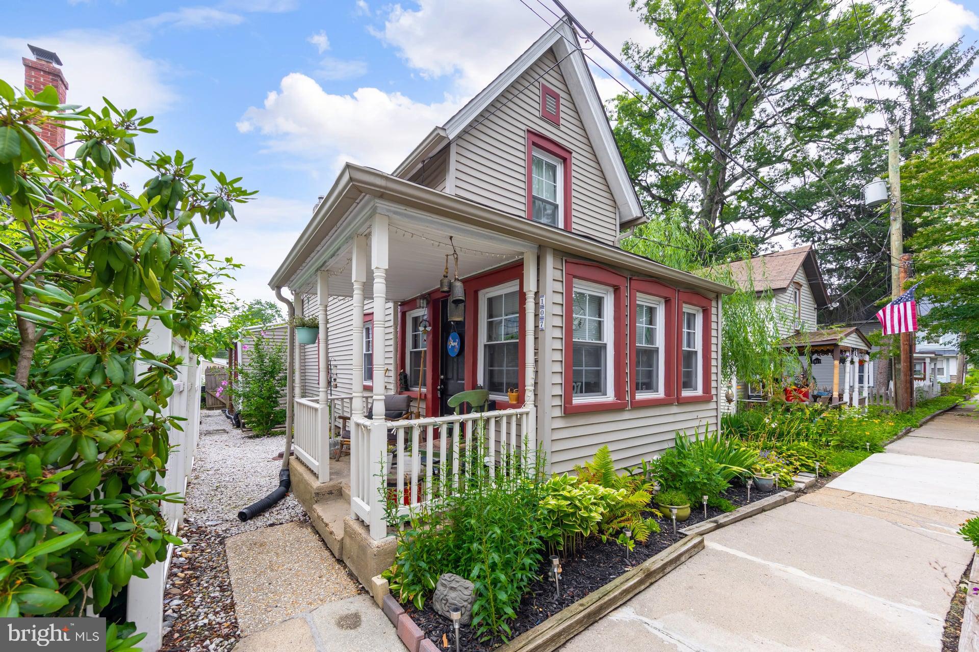 front view of a house with a small yard