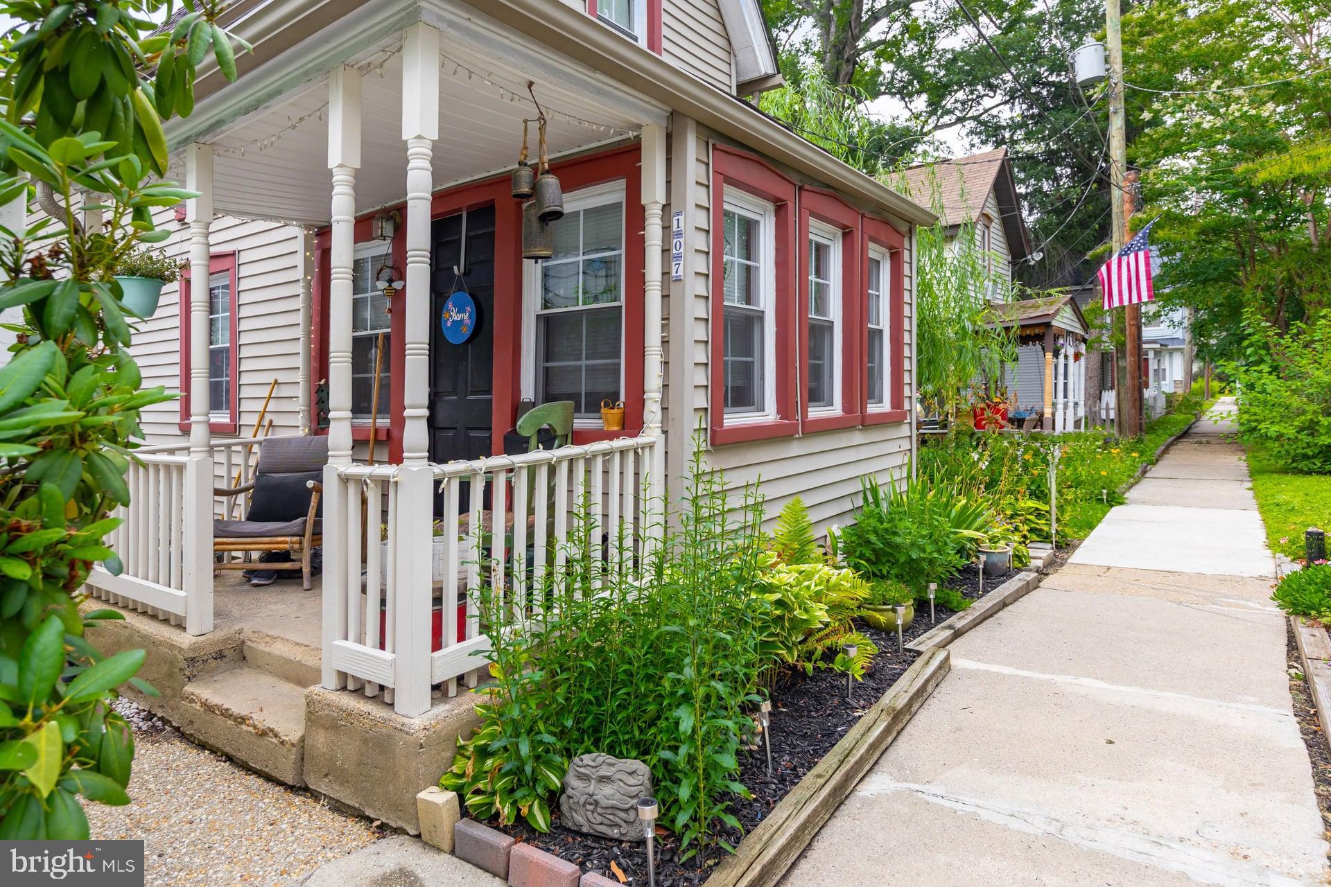 107 7th Avenue Pitman, NJ 08071 - Photo 4 of 23 front view of a house with a small yard