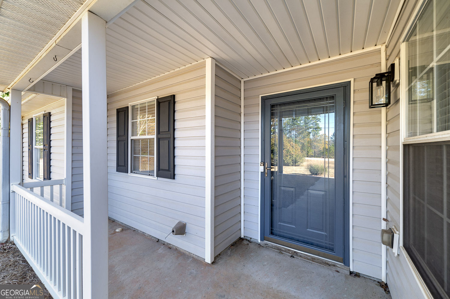 524 Leguin Mill Road Locust Grove, GA 30248 - Photo 15 of 44 a view of front door of house