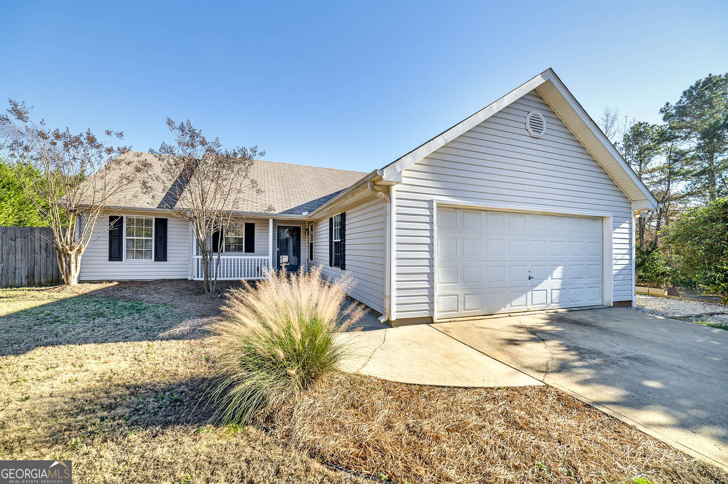 524 Leguin Mill Road Locust Grove, GA 30248 - Photo 2 of 44 a view of a house with a yard