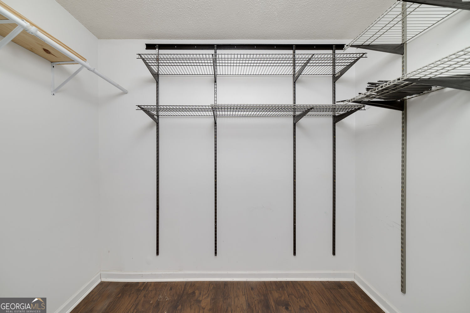 524 Leguin Mill Road Locust Grove, GA 30248 - Photo 33 of 44 a view of a room with racks on the wall