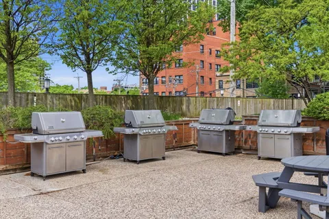 a view of a chairs and tables in the patio