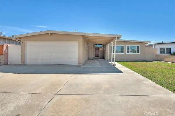 a front view of a house with yard