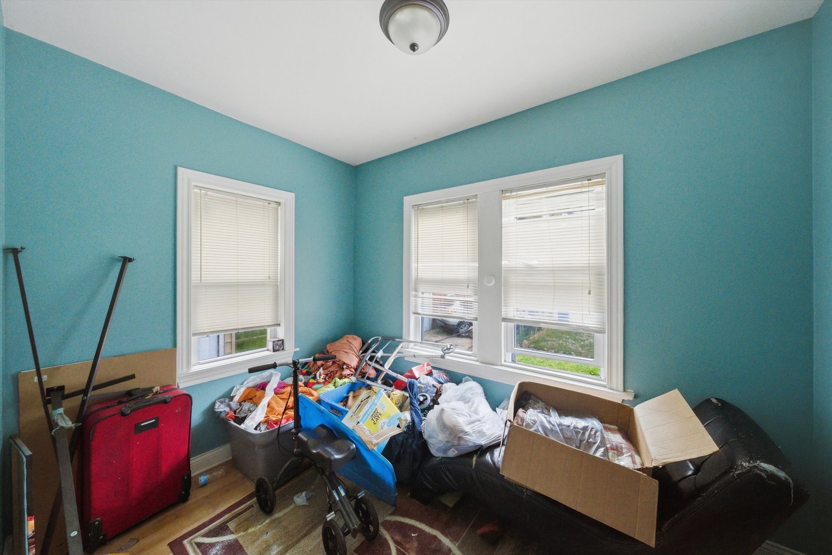 6837 South Morgan Street Chicago, IL 60621 - Photo 14 of 24 a bedroom with furniture and a window