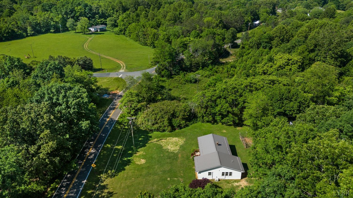1321-303 Boxwood Farm Road Amherst, VA 24521 - Photo 54 of 58 an aerial view of a house with a garden