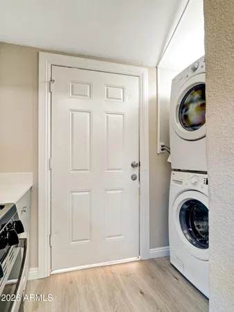 a view of a storage & utility room with washer and dryer