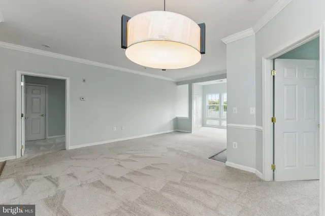 an empty room with a bathroom