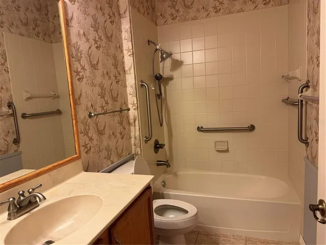 a bathroom with a sink and a toilet