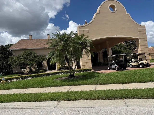 a view of a park with swings and slides