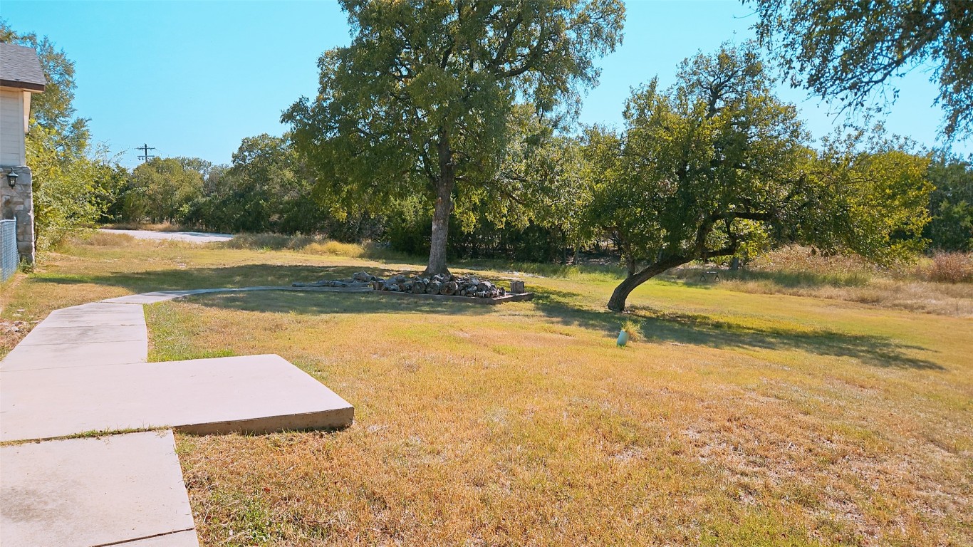 105 Meadow Drive Georgetown, TX 78633 - Photo 21 of 24 a view of a swimming pool with an outdoor space and seating area